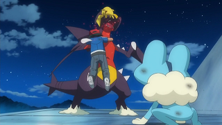 Fichier:XY003 - Pikachu de Sacha, Carchacrok du Professeur Platane et Grenousse (Flash-back).png
