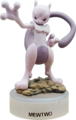 Figurine incluse dans le coffret, avec le socle blanc.