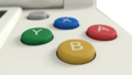 Boutons A, B, X et Y colorés et second stick « C ».