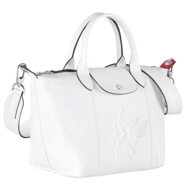 Fichier:Longchamp Sac à main blanc trois quart.png