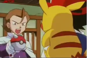 Eusine défiant Sacha.png