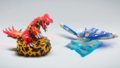 Groudon et Kyogre en figurines.